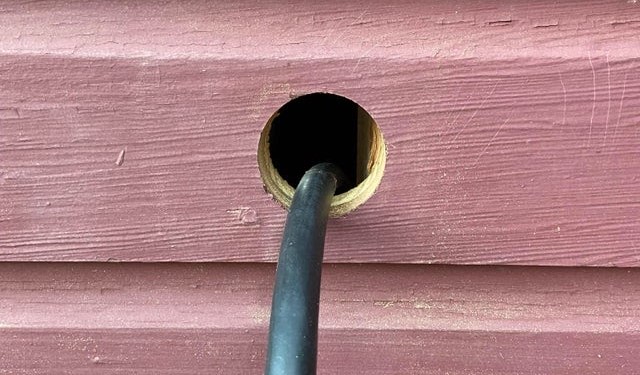 a joint compound putty knife to fill holes in drywall for finished wall